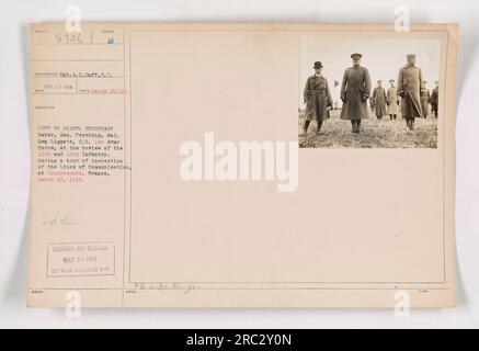 Caption: Secretary Baker, General Pershing, and Major General Liggett at the review of the 16th and 18th Infantry during a tour of inspection of the Lines of Communication at Gondrecourt, France, on March 20, 1918. Photograph taken by Sergeant A.C. Duff, S.C. Released on May 2, 1918, by War College Div. Ex.gs. Stock Photo