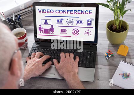 Video conference concept shown on a laptop used by a man Stock Photo