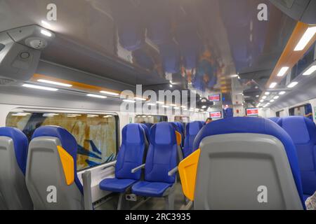 interior of the modern fast train inside and regional Italian trains Stock Photo