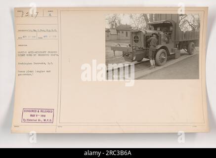 Caption: 'Photograph taken by Lt. Vn. C. Fox, Sig. R. C. on April 26, 1918, showcases a mobile anti-aircraft searchlight deployed by the Engineer Corps during World War One. This equipment was issued at Washington Barracks, D.C. and featured a power plant comprising of an engine and generator. Image censored and released on May 9, 1918 by the Historical Branch of the War Plans Division.' Stock Photo