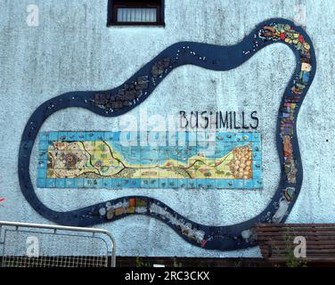 Tourist murals in Bushmills, showing the village and nearby attractions,  Riverside Ct, Bushmills, County Antrim, Northern Ireland, UK,  BT57 8SF Stock Photo