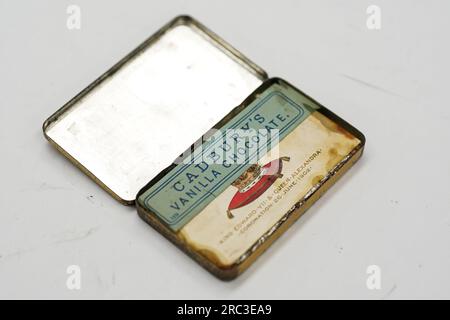 A tin containing Cadbury's chocolates, made to celebrate the coronation of King Edward VII and Queen Alexandra on June 26, 1902, before they go up for sale by auction at Hanson's Auctioneers in Etwal, Derbyshire, with a guide price of £100-£150. The special tin of Cadbury's vanilla chocolates was given to nine-year-old Mary Ann Blackmore by her Durham school and and treasured them as a memento of an important royal occasion for her entire life, until her death at the age of 96 in 1988. Picture date: Wednesday July 12, 2023. Stock Photo