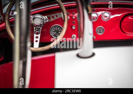 Classic Car Dashboard and Steering Wheel. Vintage Automotive and Collectibles Theme. Stock Photo