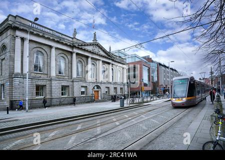 Tram tracks in front of Royal College of Surgeons in Dublin Stock Photo