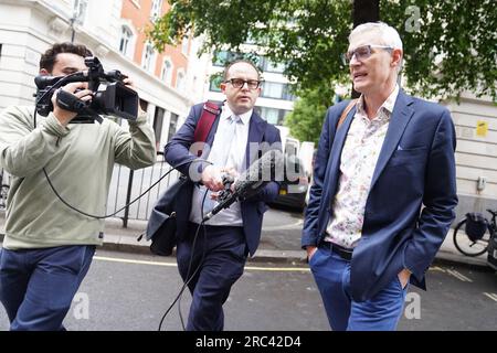 Jeremy Vine speaking to the media as he leaves Wogan House in London after presenting his BBC Radio 2 programme. The TV and radio host earlier said that the unnamed presenter at the heart of the BBC scandal 'needs to come forward'. Speaking on his Channel 5 show, Vine - who also hosts an afternoon show on BBC Radio 2 - said: 'It's his decision but he needs to come forward now, I think.' Issue date: Wednesday July 12, 2023. Stock Photo