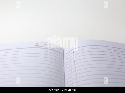 Open notebooks isolated on white background Stock Photo