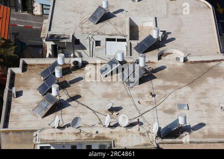 Roof solar powered water heaters in Haifa, Israel. Stock Photo