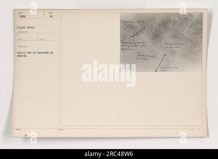 US soldier examining issued symbol maps and charts in the Foret d ...
