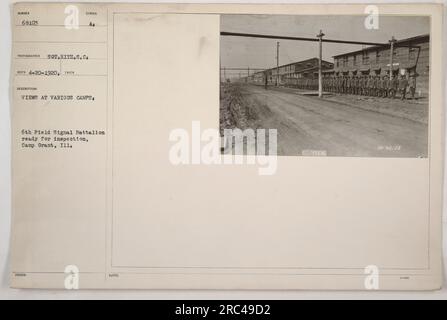 Soldiers from the 6th Field Signal Battalion at Camp Grant, Illinois, prepare for inspection. The photograph, taken on April 20, 1920, was captured by Sot. HitZ, an official US photographer. This image showcases the military activities and training exercises conducted at the camp during World War One. Stock Photo