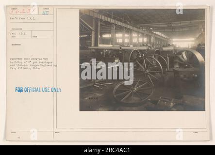 Workers at the Morgan Engineering Co. in Alliance, Ohio are seen erecting a shop to construct 6-inch gun carriages and limbers during World War One. The photograph was taken in January 1919 and was part of the collection of American military activities. Issued for official use only. Stock Photo