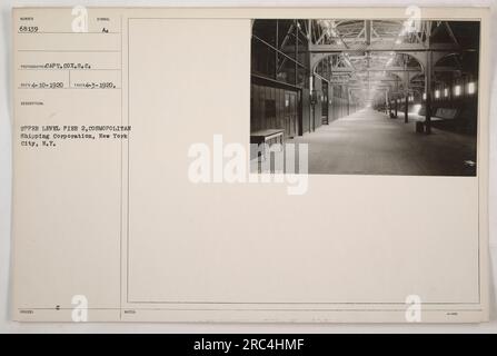 Members of the American military in action on the upper level of Pier #2 at the COSMOPOLITAN Shipping Corporation in New York City. The photograph, taken on April 3, 1920, shows soldiers handling fire hoses labeled 'MA ARIZO FIRE HOSE 2.' Stock Photo