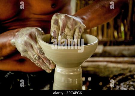 Potters working on making ceramic pieces in Maragoipinho, city of Aratuipe, Bahia. Stock Photo