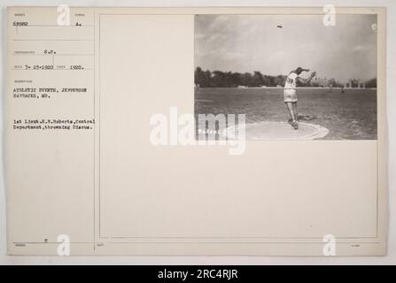 1st Lieutenant E.R. Roberts from the Central Department can be seen throwing the discus at an athletic event held in Jefferson Barracks, Missouri. The photograph was taken in 1920 and is numbered 68982. It is part of a series documenting American military activities during World War One. Stock Photo