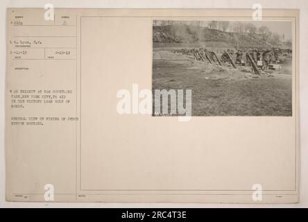 Firing of 6-inch Newton mortars at War Exhibit in Van Cortland Park, New York City. The exhibit aimed to aid in the sale of Victory Loan bonds. Lieutenant Lyon captured the photograph on April 29, 1919, showcasing the activity and equipment used during the war. Stock Photo