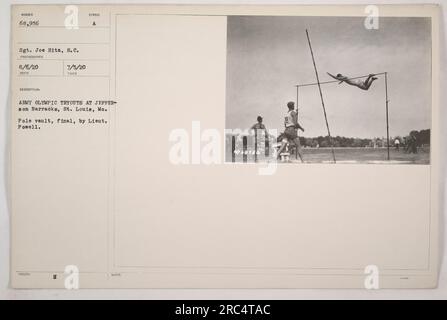 Lieutenant Powell competes in the pole vault final during the Army Olympic tryouts at Jefferson Barracks in St. Louis, Missouri. Sergeant Joe Hitz of the Signal Corps captured the photo on August 6, 1920. Symbol A issued this photograph on July 5, 1920, with the identification number 68,956. Stock Photo
