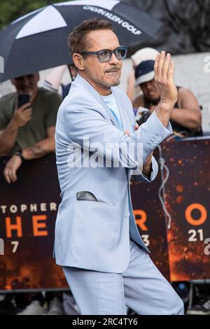 Robert Downey Jr. poses for photographers at the photo call for the ...