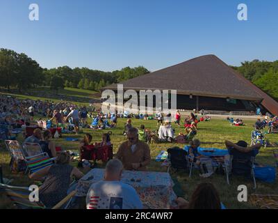 Cuyahoga Falls, OH, USA - July 4, 2023: Concertgoers begin gathering on the lawn at the Blossom Music Center for a Fourth of July concert by the Bloss Stock Photo