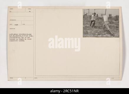 Caption: Capt. Mills Kitchen (USA) and Sgt. Major Madden (British Army) demonstrating the use of bayonet in 1918. This photograph shows the proper technique of bayonet fencing as taught by the American and British armies during World War I. Stock Photo