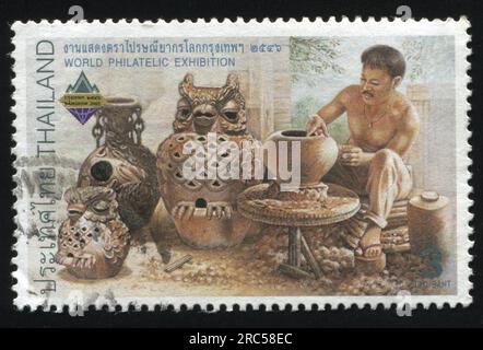 RUSSIA KALININGRAD, 31 MAY 2016: stamp printed by Thailand, shows Craftsman, circa 2003 Stock Photo