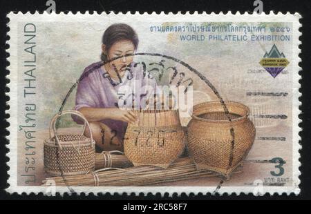 RUSSIA KALININGRAD, 31 MAY 2016: stamp printed by Thailand, shows Craftswoman, circa 2003 Stock Photo