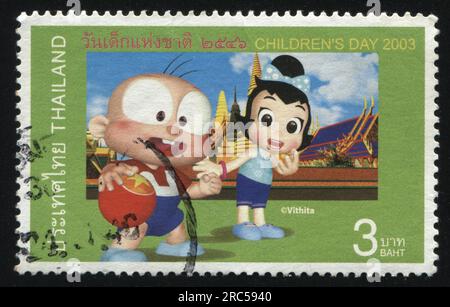 RUSSIA KALININGRAD, 31 MAY 2016: stamp printed by Thailand, shows Children, circa 2003 Stock Photo