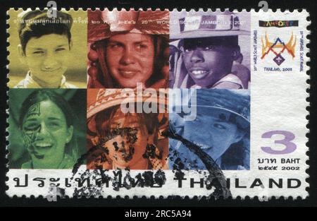 RUSSIA KALININGRAD, 31 MAY 2016: stamp printed by Thailand, shows six photos of people of different nation, dedicated to 20th world Scout Jamboree, ci Stock Photo