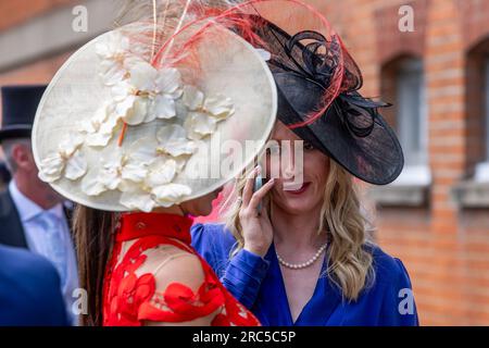 Ascot, UK. 22nd June, 2023. Racegoers arrive at Royal Ascot on Gold Cup Day. Many spectators for Gold Cup Day, the third day of Royal Ascot which has also been known as Ladies' Day since 1823, wear extravagant hats and outfits. Credit: Mark Kerrison/Alamy Live News Stock Photo