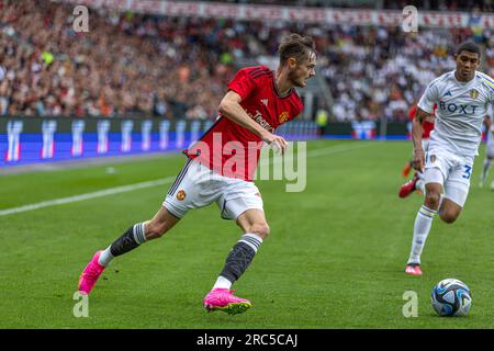 Oslo, Norway 12 July 2023 Joe Hugill of Manchester United keeps possession of the ball during the pre season football friendly match between Manchester United and Leeds United held at the Ullevaal Stadium in Oslo, Norway credit: Nigel Waldron/Alamy Live News Stock Photo