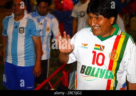 LA PAZ, BOLIVIA, 30th October 2012. Bolivian president Evo Morales waves to supporters before a match against a team from the Argentine Embasy during a futsal tournament in La Paz. Stock Photo