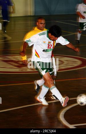 LA PAZ, BOLIVIA, 30th October 2012. Bolivian president Evo Morales shoots for goal while playing for his Presidencia Team in a futsal tournament in La Paz. Stock Photo