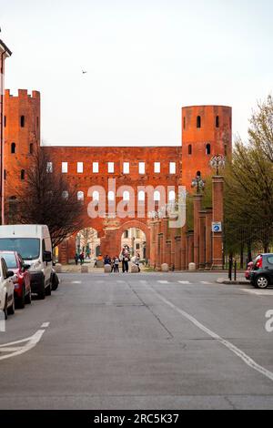 Turin, Italy - March 27, 2022: The Palatine Gate, Porta Palatina is a Roman Age city gate in Turin, providing access through the city walls of Julia A Stock Photo