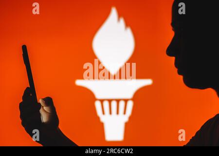 Brazil. 12th July, 2023. In this photo illustration, a person holds a smartphone with the Gettr logo in the background. (Credit Image: © Rafael Henrique/SOPA Images via ZUMA Press Wire) EDITORIAL USAGE ONLY! Not for Commercial USAGE! Stock Photo