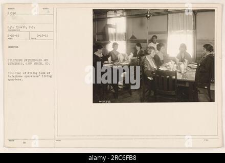 Interior of dining room in the telephone operators' living quarters at Camp Meade, MD. The room is organized and tidy, with tables and chairs set up for meals. It provides a comfortable space for the telephone operators to relax and dine during their service in World War One. Stock Photo