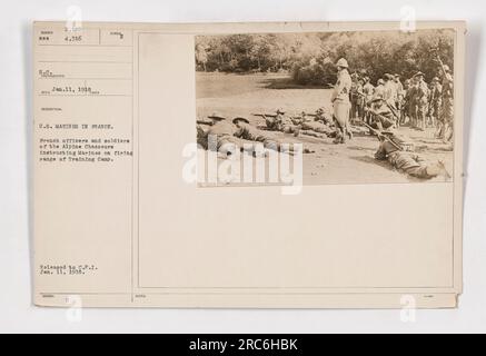 United States Marines in France receive instruction on a firing range from French officers and soldiers of the Alpine Chasseurs at Training Camp NUMBER Bee. This photograph was taken on January 11, 1918 and released to C.P.I. Stock Photo