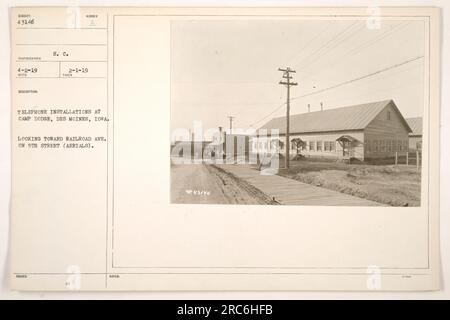 'The image shows telephone installations at Camp Dodge in Des Moines, Iowa. It was taken on February 1, 1919, and shows a view towards Railroad Ave on 5th Street, including the aerials. The information is highlighted by S. C. Isqued, and it was taken for the purposes of documentation during World War One.' Stock Photo