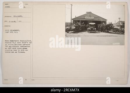 Fire Department Headquarters, Station No.1 at Camp Dix, New Jersey. In the center is the Chief's car. On the left is an American La France 750-gallon triple combination fire truck with Lieutenant Adams and enlisted men serving as firemen. Photograph taken by SIG. CORPS. on February 14, 1920, with the identification number 67601. Photo shows the official fire department of Camp Dix. Stock Photo