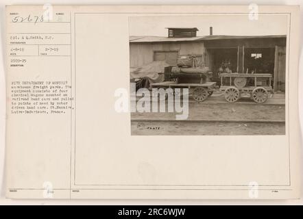 Fire Department of Montoir warehouse freight yards in St. Nazaire, France. The equipment shown in the image consists of four chemical wagons mounted on railroad hand cars, which are pulled to points of need by motor-driven hand cars. This photograph was taken on April 8, 1919, and was received by photographer Subiect on February 7, 1919. Stock Photo