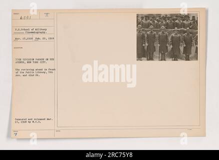 Troops from the 77th Division are seen parading on 5th Avenue in New York City. The parade took place in front of the Public Library, located at 5th Ave. and 42nd St. The photograph was taken on either March 13 or February 22, 1918, and it was censored and released on March 16, 1918. Stock Photo