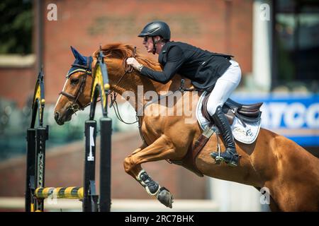 Daniel Coyle of Ireland competes in the Rolex North American Grand Prix at Spruce Meadows. Stock Photo