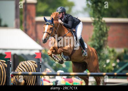 Daniel Coyle of Ireland competes in the Rolex North American Grand Prix at Spruce Meadows. Stock Photo