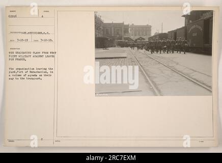 The graduating class from West Point Military Academy departs from the Port of Embarkation in squads, en route to the transport ship, numbered 60916. Photograph taken on July 12, 1919, and issued as official documentation. Photographer listed as GT.Stfiniger from the Symbol Photographers. Stock Photo