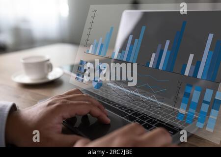 analyzing on a laptop Showing business analytics dashboard technology management strategy datum concept process report chart success investment statis Stock Photo