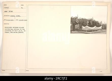 President Woodrow Wilson addressing American soldiers of the A.E.F. (American Expeditionary Forces) in Humes, Hte. Marne, France. This photo was taken on December 25, 1918, and was awarded Abridgement No. 36780 by the Signal Corps. It was received on February 19, 1921. The image captures the President delivering a speech to the soldiers. Stock Photo