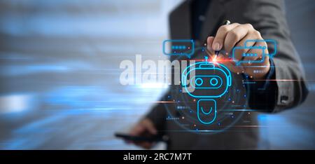 Businessman holding a light chatbot hologram intelligence AI. Digital chatbot, robot application.Chat bot with AI Artifice intelligent developers digi Stock Photo