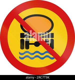 Icelandic traffic sign prohibiting thoroughfare of vehicles transporting goods dangerous to water reserves. Stock Photo