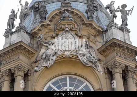 BUDAPEST, HUNGARY - MARTH 13, 2023: This is a fragment of the decoration of the tower of the baroque chapel of the Vajdahunyad castle with the coat of Stock Photo