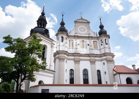 Whitewashed façade of St. Michael's Church or St. Michael the Archangel Church with twin towers in Vilnius, Lithuania Stock Photo