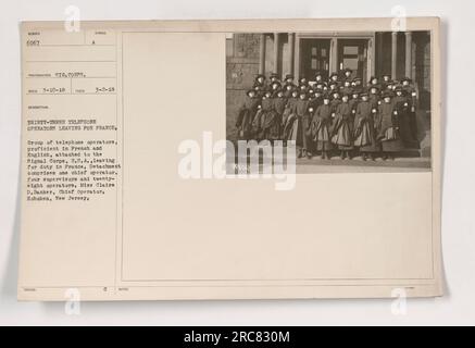 'Group of thirty-three telephone operators leaving for duty in France as part of the Signal Corps, U.S.A. Detachment includes one chief operator, four supervisors, and twenty-eight operators. The operators are proficient in both French and English. Photo taken on March 2, 1918, in Hoboken, New Jersey.' Stock Photo