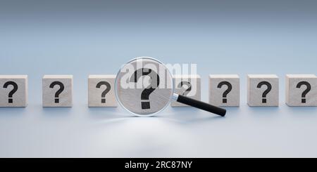 Cubes with question marks and magnifying glass analyzing question. thinking and watching question mark. questions, analysis and problem solving Stock Photo