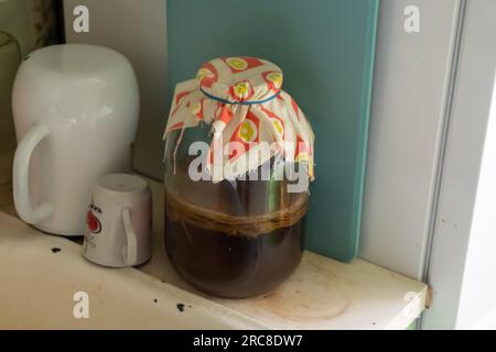 Large jar of home made kombucha Stock Photo